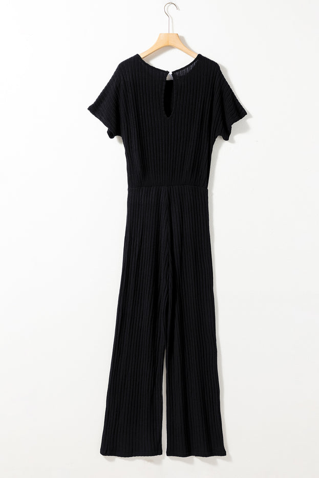 Zwarte geribbelde jumpsuit met sleutelgat, korte mouwen en wijde pijpen